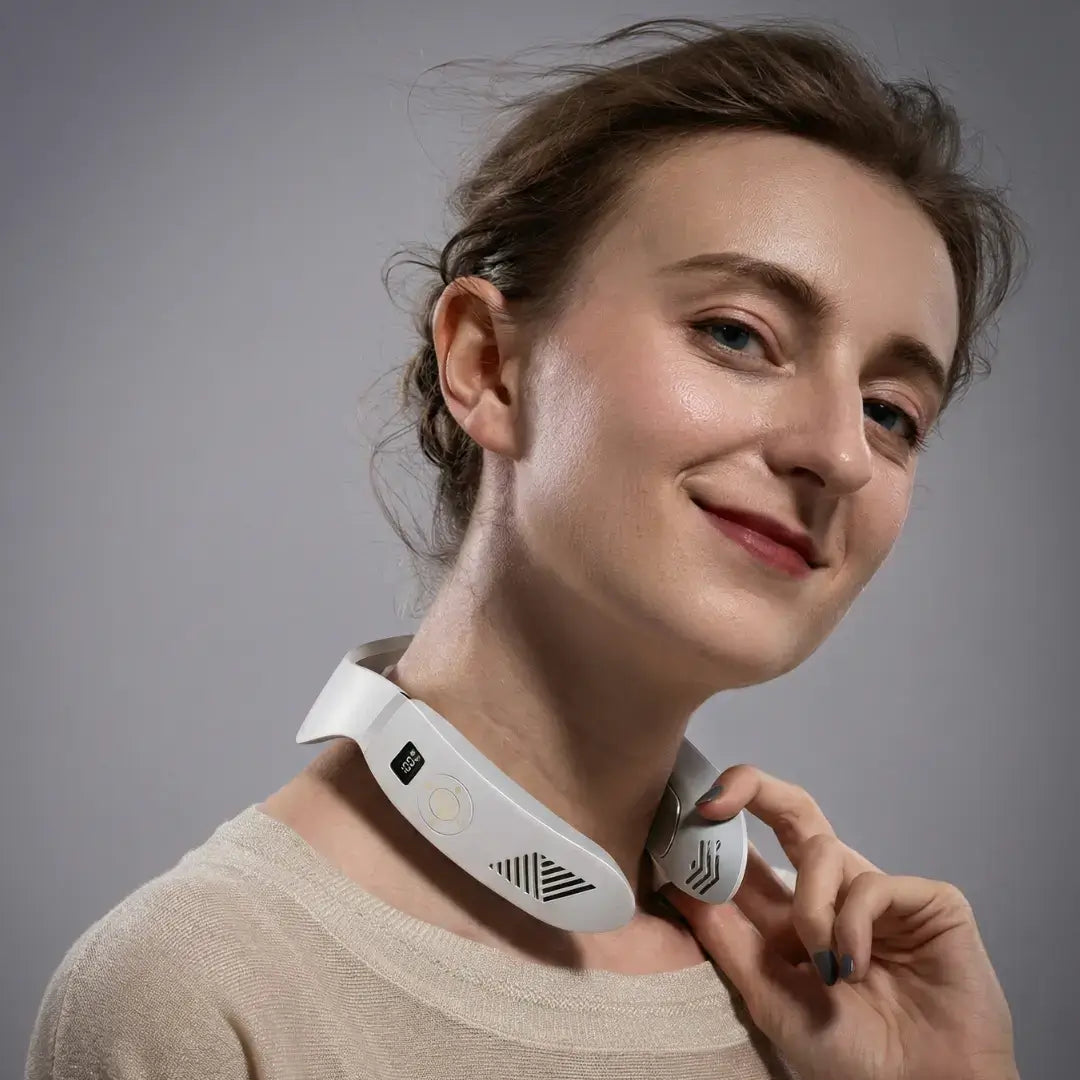 Woman using the Asmenix Smart Neck Massager, smiling and holding the device near her neck.
