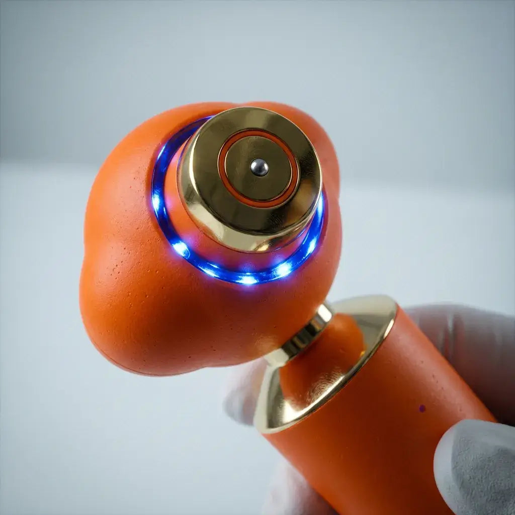 Biomax TeraEye device with blue LED lights for lifting and brightening the eye area, held in a gloved hand.
