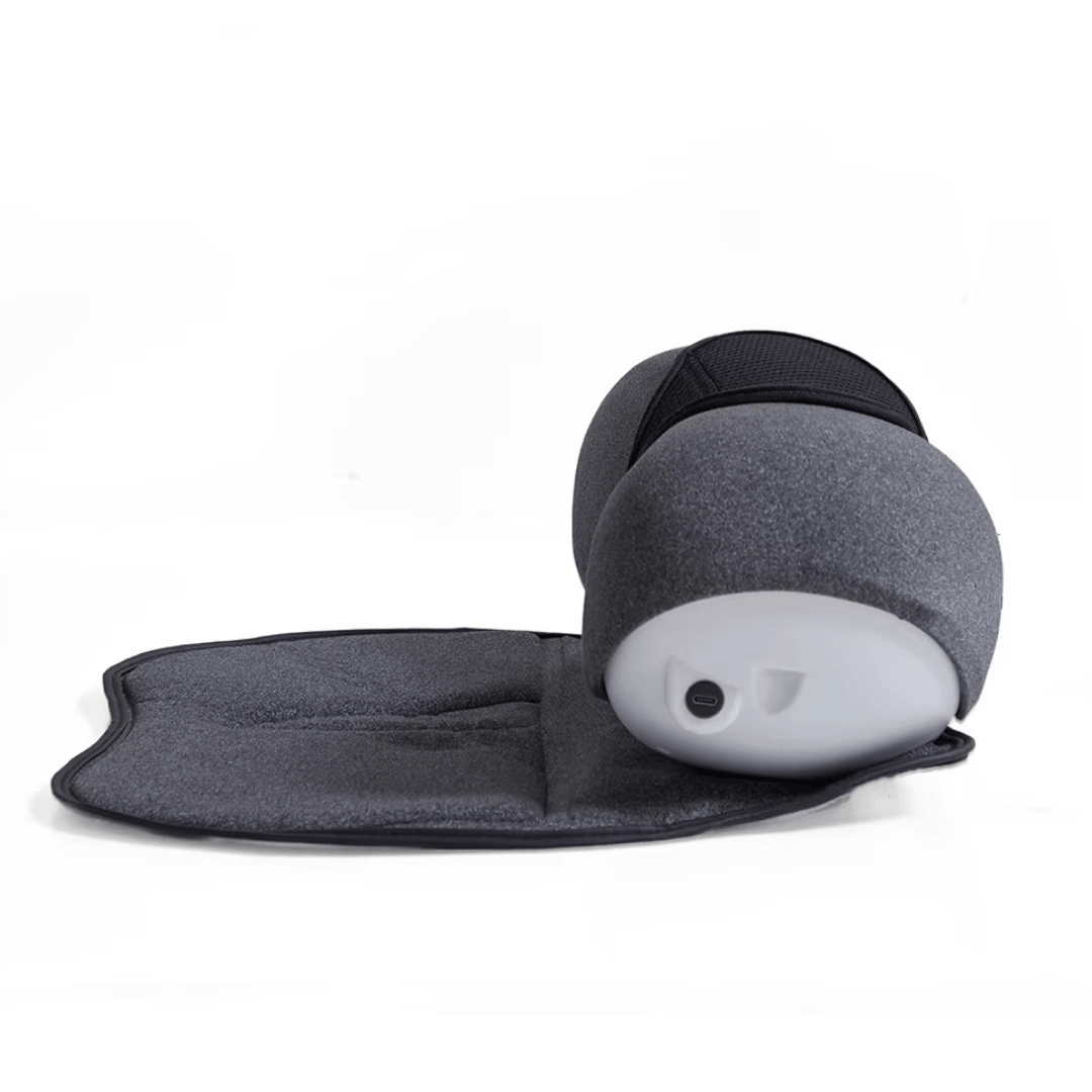 CerviCloud Neck Stretch Pillow in gray, showcasing its soft texture and supportive design on a flat surface.