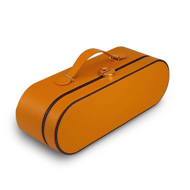 Stylish orange oval handbag with handle and zipper closure.