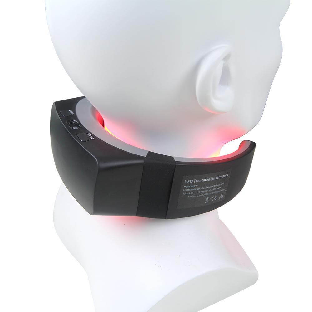 Halipax Dual-Light Neck Device resting on a mannequin's neck, showcasing its sleek design and soft red light.