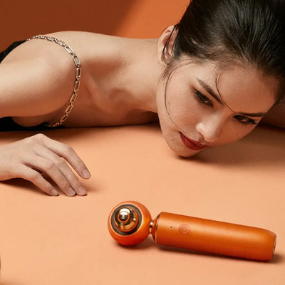Biomax TeraEye skin care device with woman relaxing on peach background, promoting lifted and brightened skin appearance.