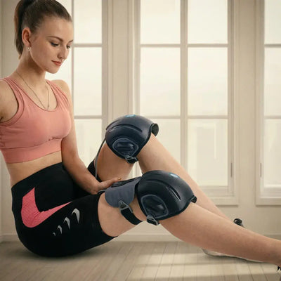 User relaxing while using the FlexiTherm Pro Knee Device for soothing knee comfort.