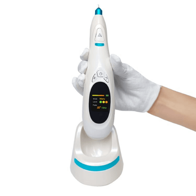 HaliPlasma Pro Beauty Device held in hand, showcasing precision plasma technology for smoother control and refined results.