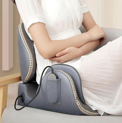 Close-up of a person relaxing with the Hipology Massage Seat, highlighting its ergonomic design and heating feature.