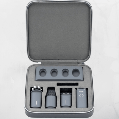 Vellura-Gess Contour & Renew set in a compact gray case, showcasing multiple skincare device attachments.