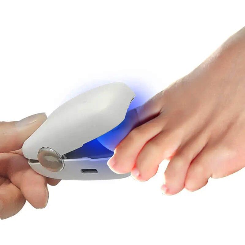 HALIPAX NailRenew compact laser tool shown with targeted light feature
