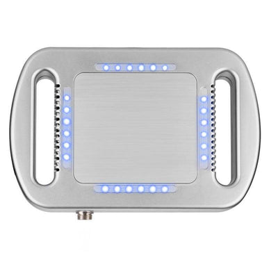 Top view of the CryoPad-X Cryo Sculpt Device featuring blue indicator lights and handles.