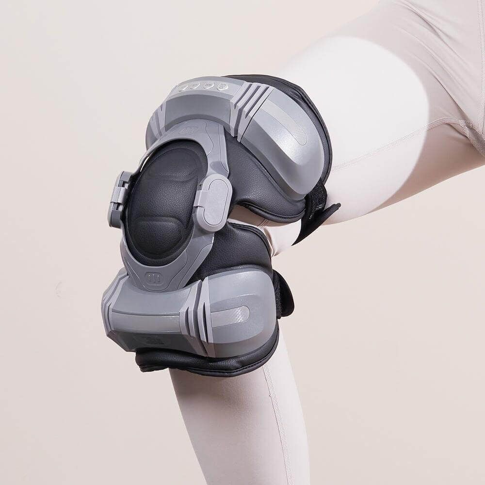 FlexWave Air Knee Massager wrapped around a knee, showcasing its ergonomic design and adjustable straps.